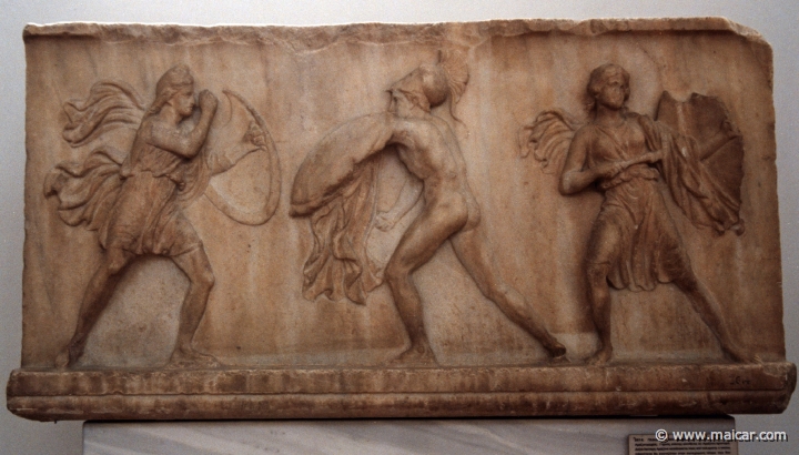 6232.jpg - 6232: Relief slab, perhaps frieze. Naked hoplite attacks amazon. Middle of the 4C BC. National Archaeological Museum, Athens.