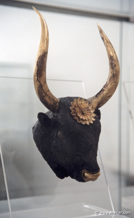 6338.jpg - 6338: From Shaft grave IV of Grave Circle A at Mycenae. A bull head rhyton of silver with gold horns and a gold rosette. National Archaeological Museum, Athens.
