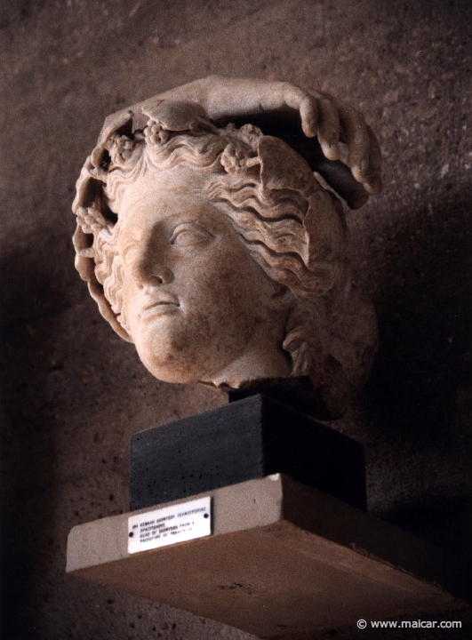 6607.jpg - 6607: Head of Dionysos. From a prototype of Praxiteles. Archaeological Museum, Corinth.