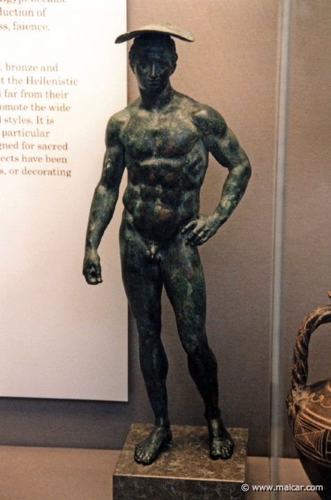 8405.jpg - 8405: Bronze statuette of Hermes wearing a petasos (wide-brimmed hat) and a band to secure his hair, c. 150 BC. British Museum, London.