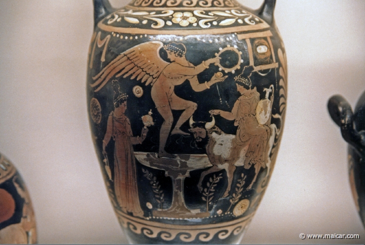 8214.jpg - 8214: Red-figured neck-amphora (jar) with two nymphs, one riding on a river god (man-faced bull) and Eros. British Museum, London.
