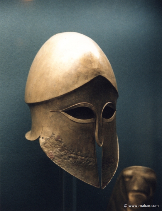 0309.jpg - 0309: Corinthian helmet from southern Italy, ca.500 BC. Staatliches Antikensammlungen, München.