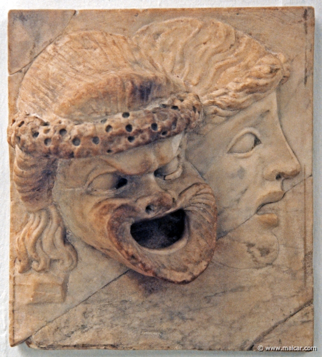 8030.jpg - 8030: Relief with tragic and comic masks. Marble. 2nd century AD and restored. British Museum, London.