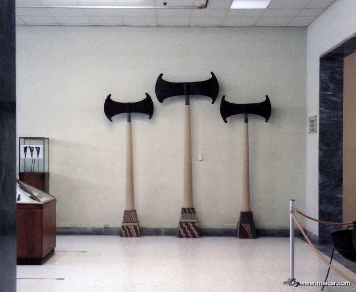 9507.jpg - 9507: Three huge bronze axes from the Minoan mansion at Nirou Chani (17th-15th C. BC). Herakleion Museum (Crete).