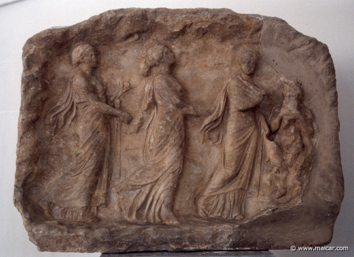 6329.jpg - 6329: Votive relief in the form of a cave. Pan playing his piepes and three Hours (Hores) dancing. From Sparta or Megalopolis, 2nd half of the 4C BC. National Archaeological Museum, Athens.
