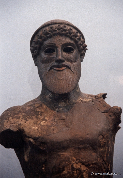 6136.jpg - 6136: Bronze statuette of Poseidon. Found in the sea in the Gulf of Livadostra in Boeotia, at the site of Kreusis, the port of Plataiai. About 480 BC. National Archaeological Museum, Athens.