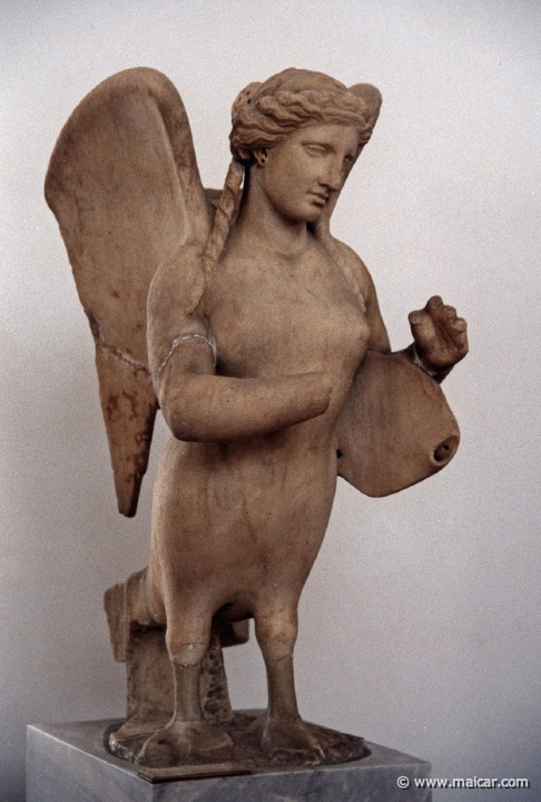 6236.jpg - 6236: Funerary siren mourning with primitive tortoise-shell lyre. Mid 4th century BC. From the Kerameikos. National Archaeological Museum, Athens.