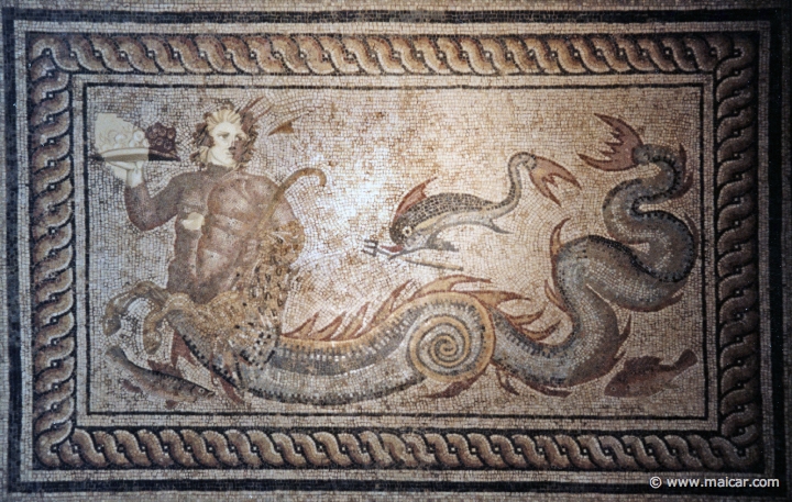 8106.jpg - 8106: A triton with a dolphin and two fish. Roman about AD 200. British Museum, London.