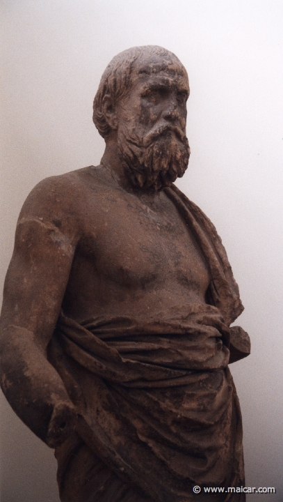 6034.jpg - 6034: Marble statue of an old man possibly of a philosopher. Original work dated around 280-270 BC. Archaeological Museum, Delphi.