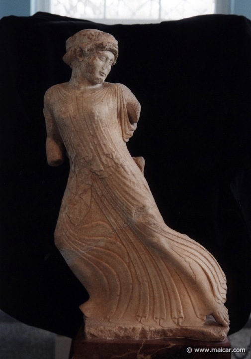 6517.jpg - 6517: Fleeing maiden. From the pediment of the Sacred House. 490-480 BC. Archaeological Museum of Eleusis.