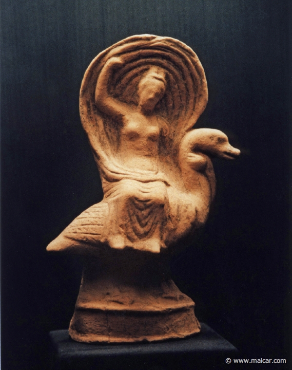 6821.jpg - 6821: Terracotta figurine of a female sitting on a swan. It represents the mythological scene of Zeus transformed into a swan ravishing Leda. North cemetery of the ancient city of Leucas. Hellenistic period. Archaeological Museum, Leucas.