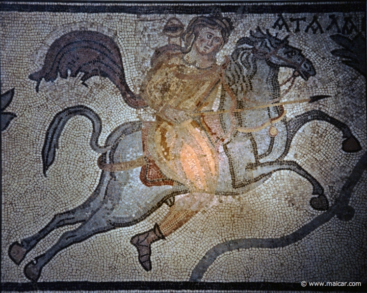 8103.jpg - 8103: Part of panel from a mosaic pavement. Roman 4th century AD: Atalanta on horseback hunts a lion.  British Museum, London.