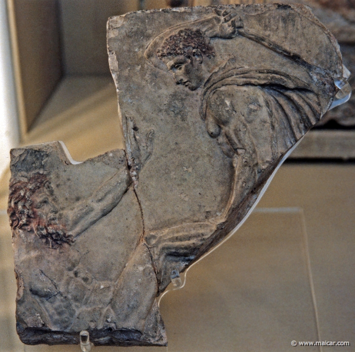 8238.jpg - 8238: Theseus and Skiron. Fragment of terracotta relief panel. Roman 1st century AD. British Museum, London.