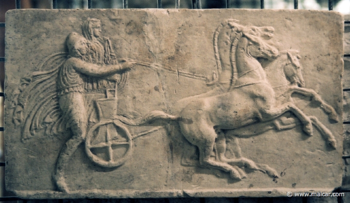 8918.jpg - 8918: Roman relief showing a young man and woman in a chariot andthe robbery of Leukippos' daughters. The piece measures 27 x 48 x 5 cm. There is no mention in the database of which museum the original belongs to. Den Kongelige Afstøbningssamling, Copenhagen.