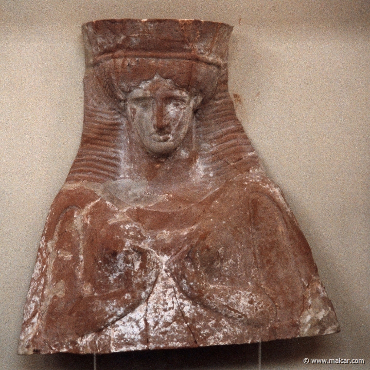 6017.jpg - 6017: Three clay female masks (Demeter or Persephone). They were found in a deposit in front of the Museum of Delphi. 5C BC. Archaeological Museum, Delphi.