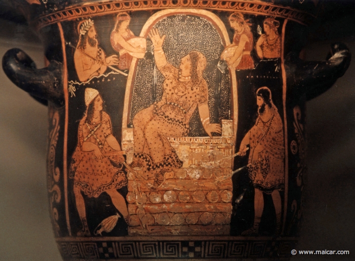 8215.jpg - 8215: Red-figured bell-krater (wine-bowl) with Alkmena seated on an altar stacked with wood. Paestum c. 330 BC. (Left: Antenor; right: Amphitryon.) British Museum, London.